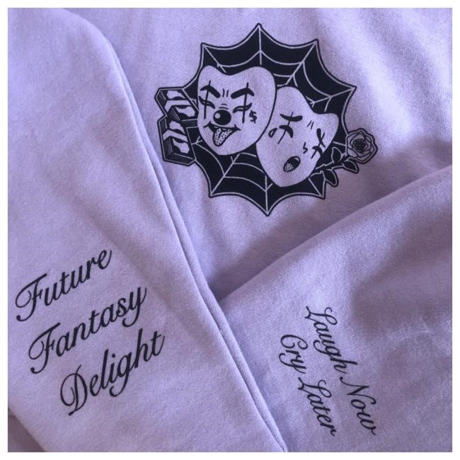 Official Meow Wolf Store Shop Merch MeowWolf Laugh Now Cry Later Popover Sweatshirt Meow Wolf Apparel Clothing